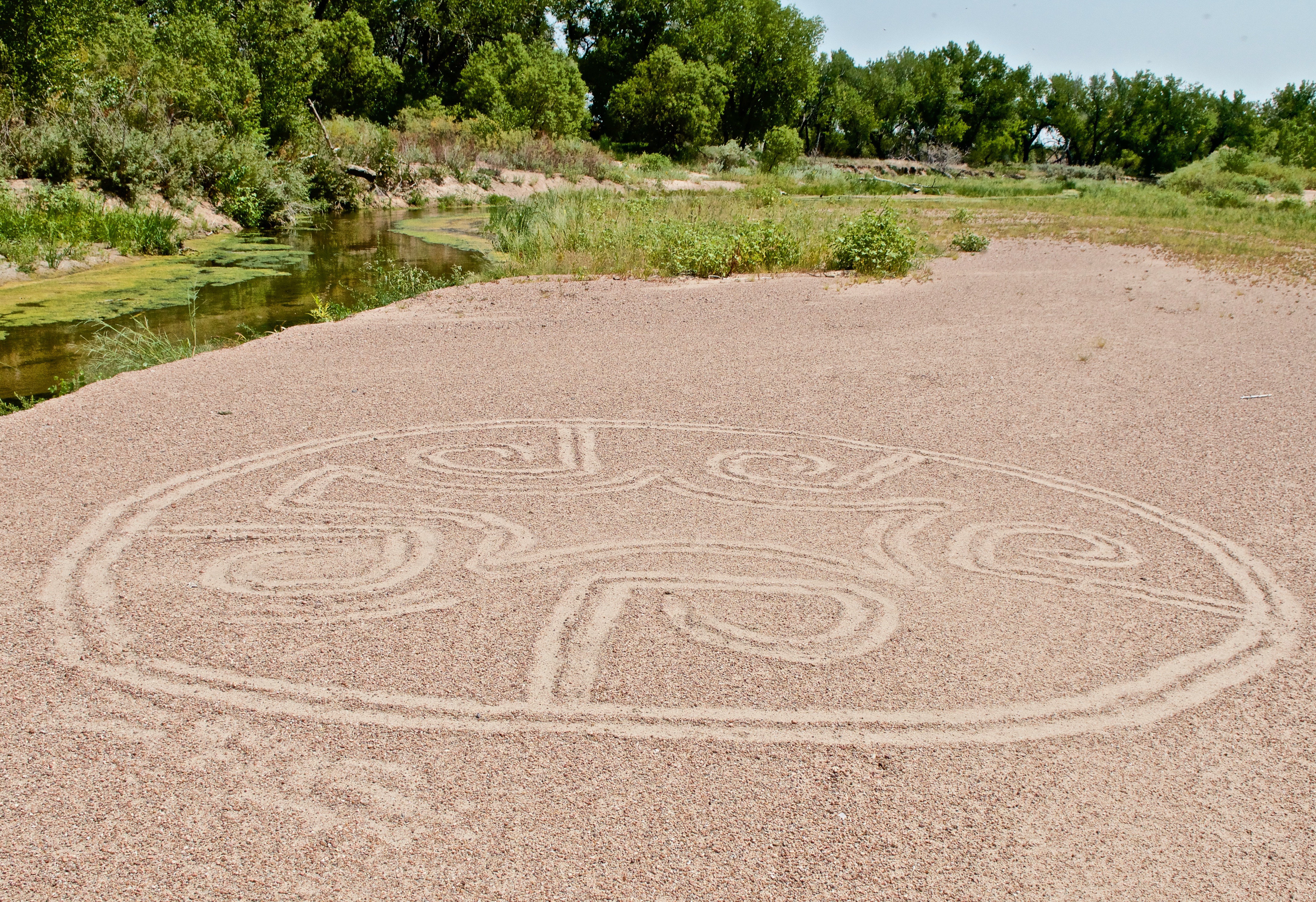 Sand Drawing Circles at Bravo